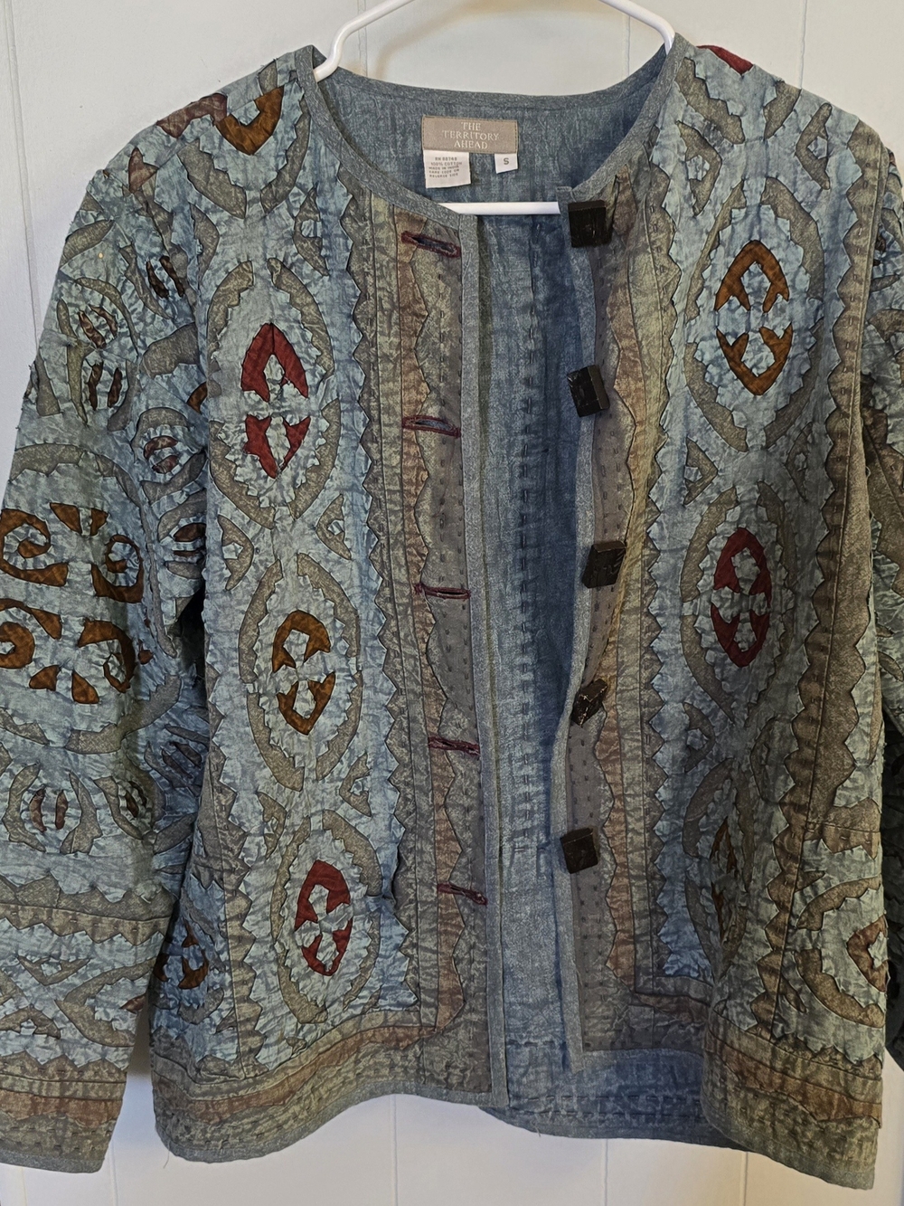 The Territory Ahead Light Blue Quilted Jacket with Rust and Brown Accents